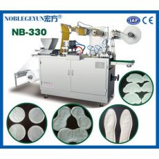 NB-330型暖寶寶包裝機，全自動發(fā)熱貼生產(chǎn)設備